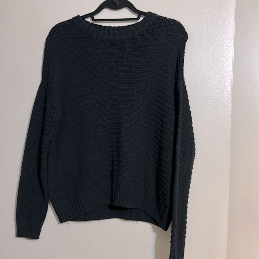 Divided knit top with semi open back